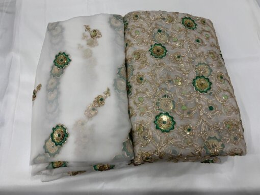 Pure Silk Shifoon Kameez Dupatta adorn with sequins and golden green thread embroidery.