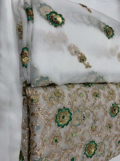 Pure Silk Shifoon Kameez Dupatta adorn with sequins and golden green thread embroidery.