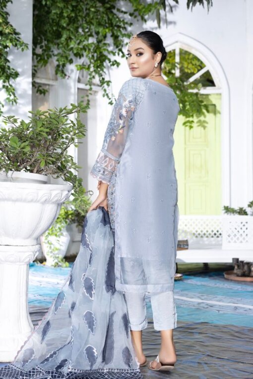 A beautiful silver hue illustrating the small floral pattern is all over! This 3-piece bridal suit of sequin, Tilla, patchy, and hand-embellished work is a very graceful dress. The suit is one of the best Pakistani bridal dresses for walima, and it has a tarkash back, tarkash front, and tarkash sleeves as well. The dress has no doubt sequin silver work, but the peachy pink floral patterns and darker shades of big florals look very enticing. Moreover, the plain grip style trouser in silk fabric exudes grace. And the chiffon fabric dupatta of this pretty mint ensemble also looks very intriguing, matching the style of the dress as well. Heavy Embroidered Sequins Tarkash Front with Hand work Kora & Dabka work